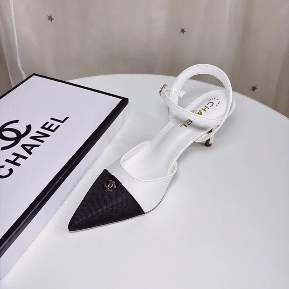 CHANEL Elegant Black and White Heels - Picture 8 of 9